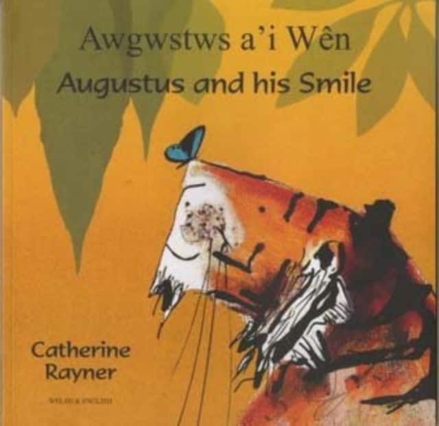 Augustus and His Smile in Welsh and English av Catherine Rayner